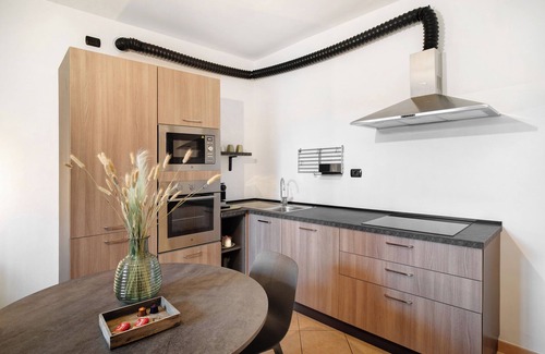 San Bartolomeo Apartment | Apartment 'La Renée' with Sea View, Shared Pool and Air Conditioning