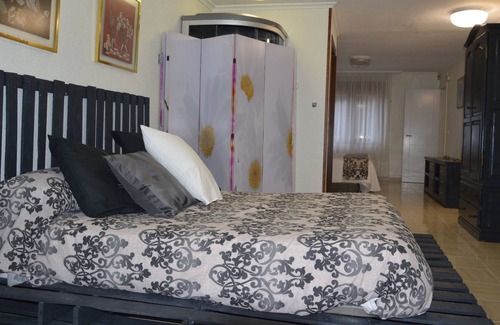 San Roman de la Llanilla Apartment | Apartment loft in chalet for 9 people garden barbecue playground beach