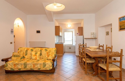 Rosignano Marittimo Apartment | Apartment 'Malva' with Shared Pool and Garden