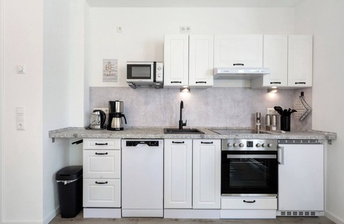 Hohwacht Apartment | Apartment 'Ostseerauschen - Blaue Welle' with Private Terrace and Wi-Fi