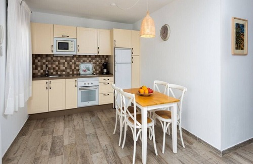 Mogan Apartment | Apartment Papaya with Mountain View, Wi-Fi & Heated Pool
