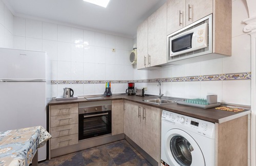 Carihuela Apartment | Apartment "Piso Carlota Alessandri" with Shared Pool & Wi-Fi