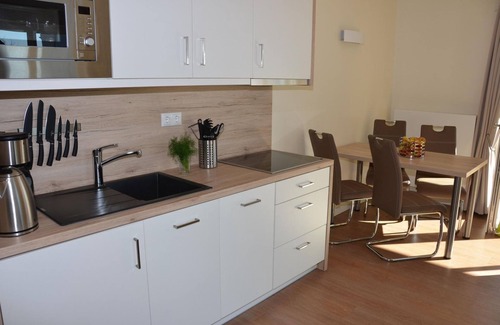 Plau am See Apartment | Apartment Plauseelig mit Bootsliegeplatz im Hafendorf Plau am See - Apartment