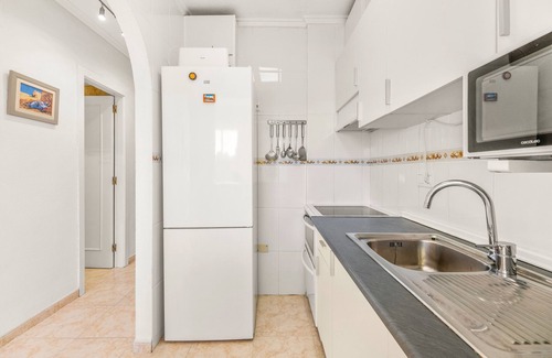 Punta Prima Apartment | Apartment 'Pleamar 23' with Sea View, Wi-Fi and Air Conditioning