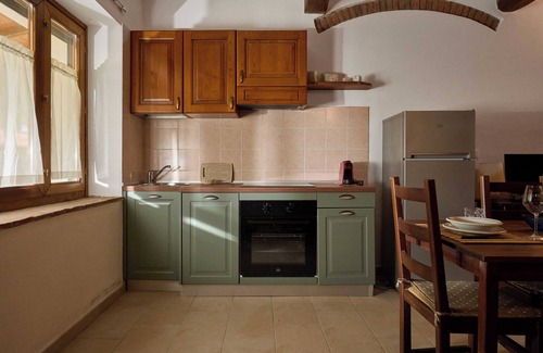 Gavorrano Apartment | Apartment 'Podere Le Sugherine - Camino' with shared pool, Wi-Fi and air conditioning