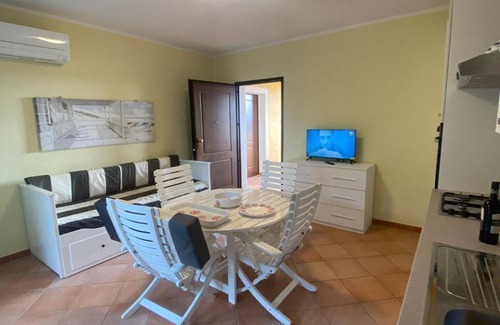 Monte Petrosu House | Apartment 'Prestige Exclusive' with Shared Pool, Wi-Fi and Air Conditioning