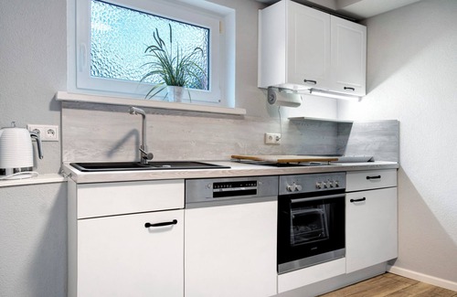 Schaprode Apartment | Apartment 'Rügenferienhaus Gartenwohnung' with Shared Terrace and Wi-Fi