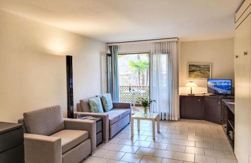 Caslano Apartment | Apartment Residenza Parcolago Apt 120 1-Stock by Interhome