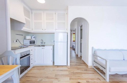 Sant Jaume Mediterrani Apartment | Apartment 'Son Bou Gardens Sup 2' with Sea View, Shared Pool and Wi-Fi