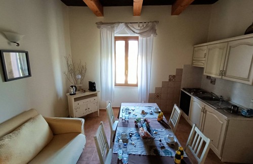 Fornole Apartment | Apartment 'Tenuta Marchesi Fezia - 1' with Shared Pool, Wi-Fi and Air Conditioning