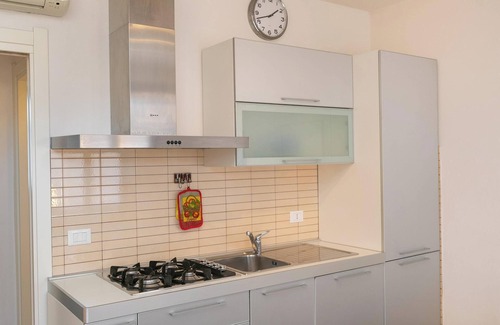 Suvereto Apartment | Apartment 'Trilocale Leccino' with Terrace, Shared Pool & Wi-Fi