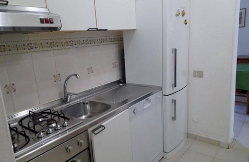 Notteri Apartment | Apartment 'Villa Porto Giunco' with Sea View, Private Terrace and Air Conditioning