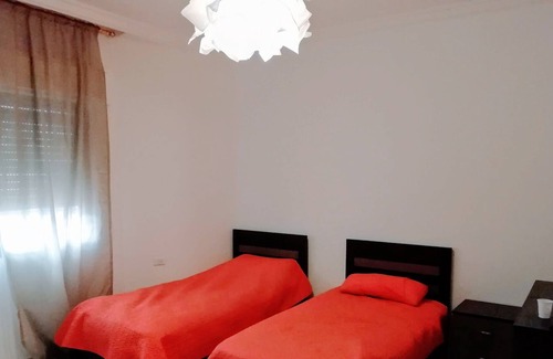 Amman Apartment | Apartment with a private terrace garden & garage