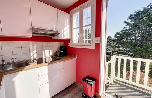 Jullouville Apartment | Apartment with balcony, garden, and beach access