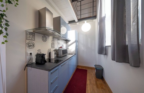Pisa City Centre Apartment | Apartment with mezzanine on the Lungarno in Pisa