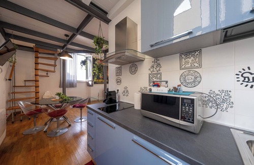 Pisa City Centre Apartment | Apartment with mezzanine on the Lungarno in Pisa