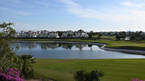 Roldan Apartment | Apartment with pool & golf views - ER2113LT