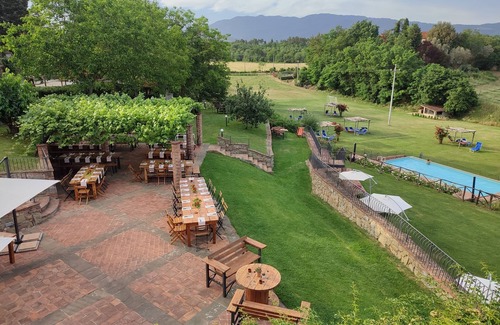 Laterina Apartment | Apartment with private terrace and panoramic views of pool, garden and Florentine mountains!