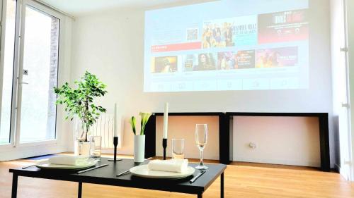 Centre Erlon Apartment | Appart SPA 80m2 avec terrasse balcon jacuzzi et sauna privatif en hyper centre Place Drouet d'Erlon