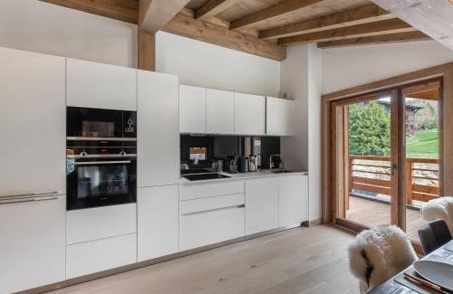 Le Planellet Apartment | Appartement élégant près des pistes avec sauna, hammam, salle de sport et parking couvert - FR-1-569-47