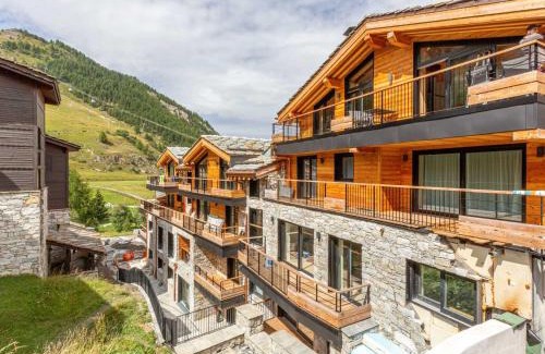 Val-d'Isere Apartment | Appartement de standing avec Wi-Fi, garage, terrasse et accès direct aux pistes à Val-d'Isère - FR-1-694-348