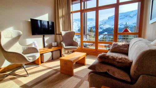 Flaine Apartment | Appartement Premium à Flaine, altitude 1740 m, 8 à 10 personnes, au pied des pistes, piscine, jacuzzi, sauna, hammam et salle de sport
