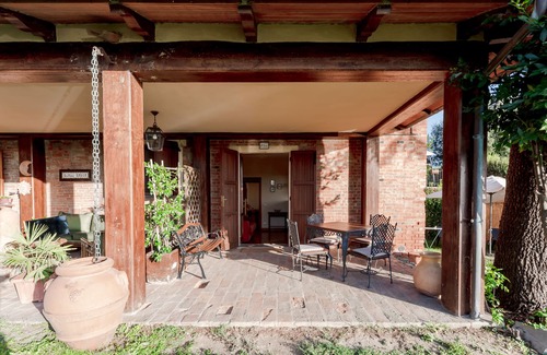 Badia Apartment | Apt. Pino with private garden, pool view and wonderful panorama.