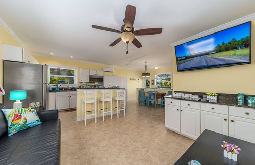 Stuart House | Aquatopia South: Riverfront Beach House, Steps 2 Ocean. Heated Pool & Dock!