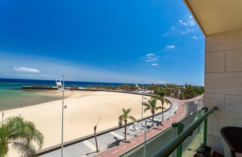 Arrecife Apartment | Arrecife Sands Apartment, op steenworp afstand van zandstrand, uitzicht op zee