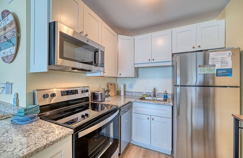 Sneads Ferry Condo | Arrr Place. Beachfront, 1 BR, pool & beach access. 2 Queens, 2 bunks