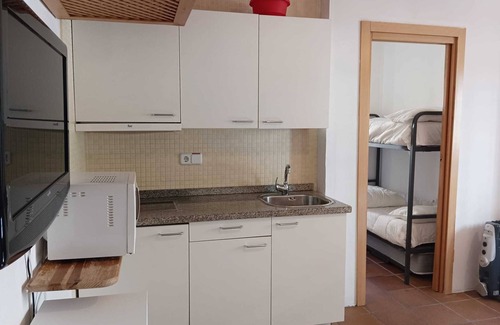 Pradollano Apartment | Arttyco Sierra Nevada building studio with pool, sauna and jacuzzi