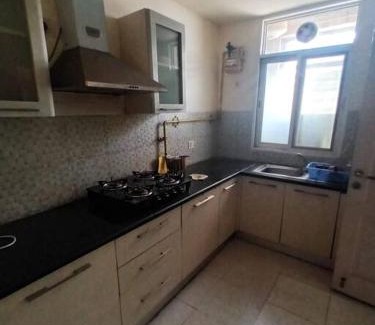 Jaypee Greens Apartment | Ashi's golf view apartment