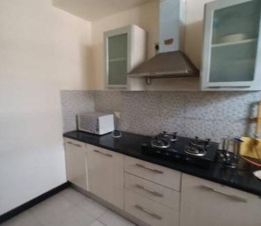 Jaypee Greens Apartment | Ashi's golf view apartment