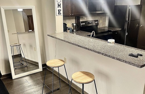 Westside Apartment | Atlanta Chic Urban Retreat Modern Apartment Stunning City Views private balcony