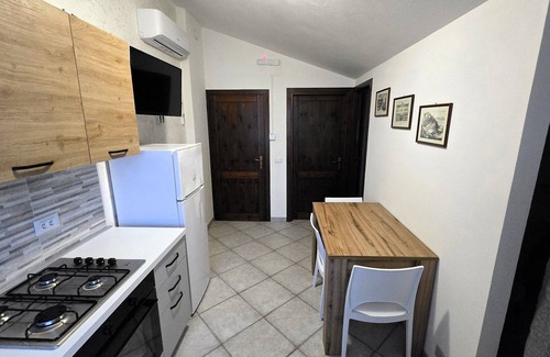 Biancareddu Apartment | Attic family apartment surrounded by nature, 2 minutes from the sea.