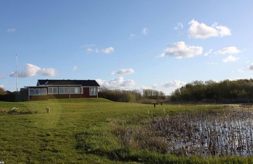 Vinderup House | Attractive, cozy wooden holiday home with a view of the picturesque Limfjord