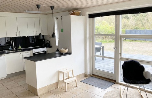 Blavand Strand House | Attractive holiday home on a lawn, with window front including WiFi, annex