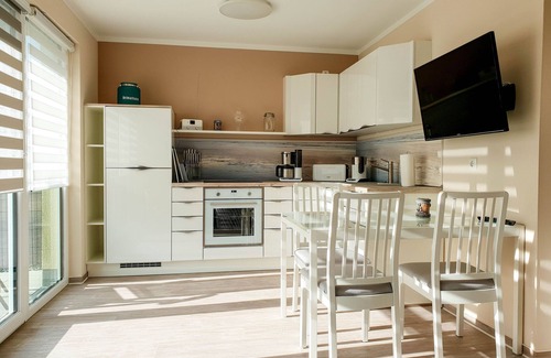 Gelbensande Apartment | Attractive vacation apartment with private garden and barbecue