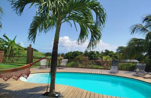 Sainte-Rose House | Au son des Grenouilles
