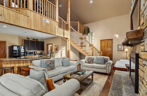 Fairview Cabin | Awesome amenities—hot tub, pool table, foosball and outdoor/indoor fireplaces!