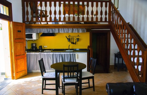 Haria House | B & BLolayJuan: Apartment kitchen, private bathroom and heated pool "LA TROJA"