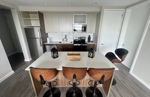 Westside Condo | Bachelor Suites W/Stadium Views