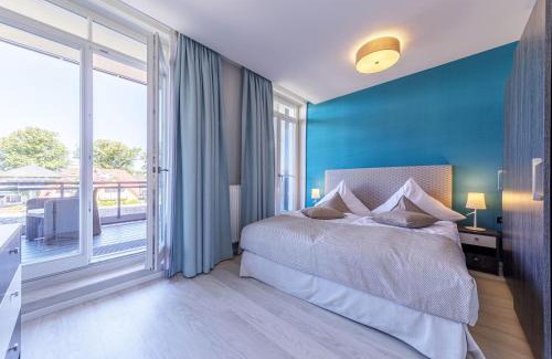 Ostseebad Wustrow Apartment | Backboard - Haustierfreundliche Ferienwohnung mit Nordbalkon für bis zu 3 Personen
