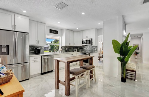 Coral Ridge Isles House | Backyard Oasis*Waterfront*Pool*Pet Friendly!