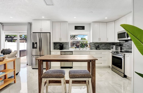 Coral Ridge Isles House | Backyard Oasis*Waterfront*Pool*Pet Friendly!