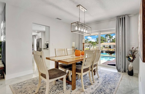 Coral Ridge Isles House | Backyard Oasis*Waterfront*Pool*Pet Friendly!