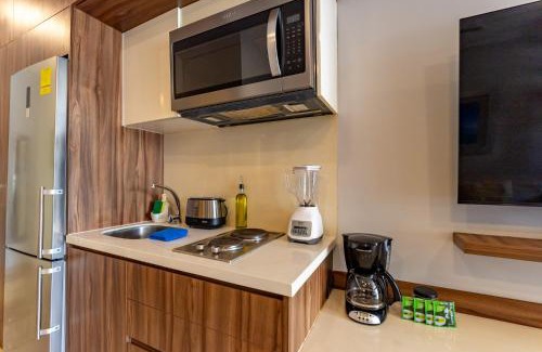 Zazil-ha Apartment | Bahay Condos steps from the beach and 5th ave