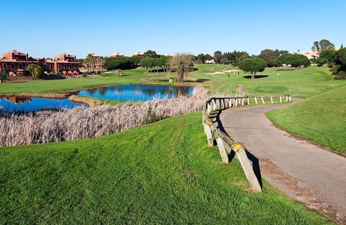 Islantilla Apartment | Bajo con Jardín en Golf Islantilla
