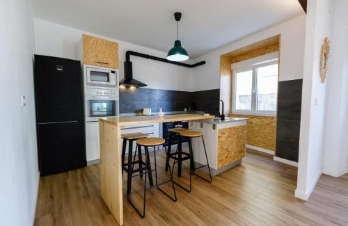 Outes House | Balcón de Braño