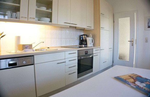 Gohren Apartment | Balcony, free use of the AHOI adventure pool and sauna -Residenz Strandeck FeWo01